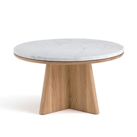 Échos Round Coffee Table,  designed by E. Gallina.
